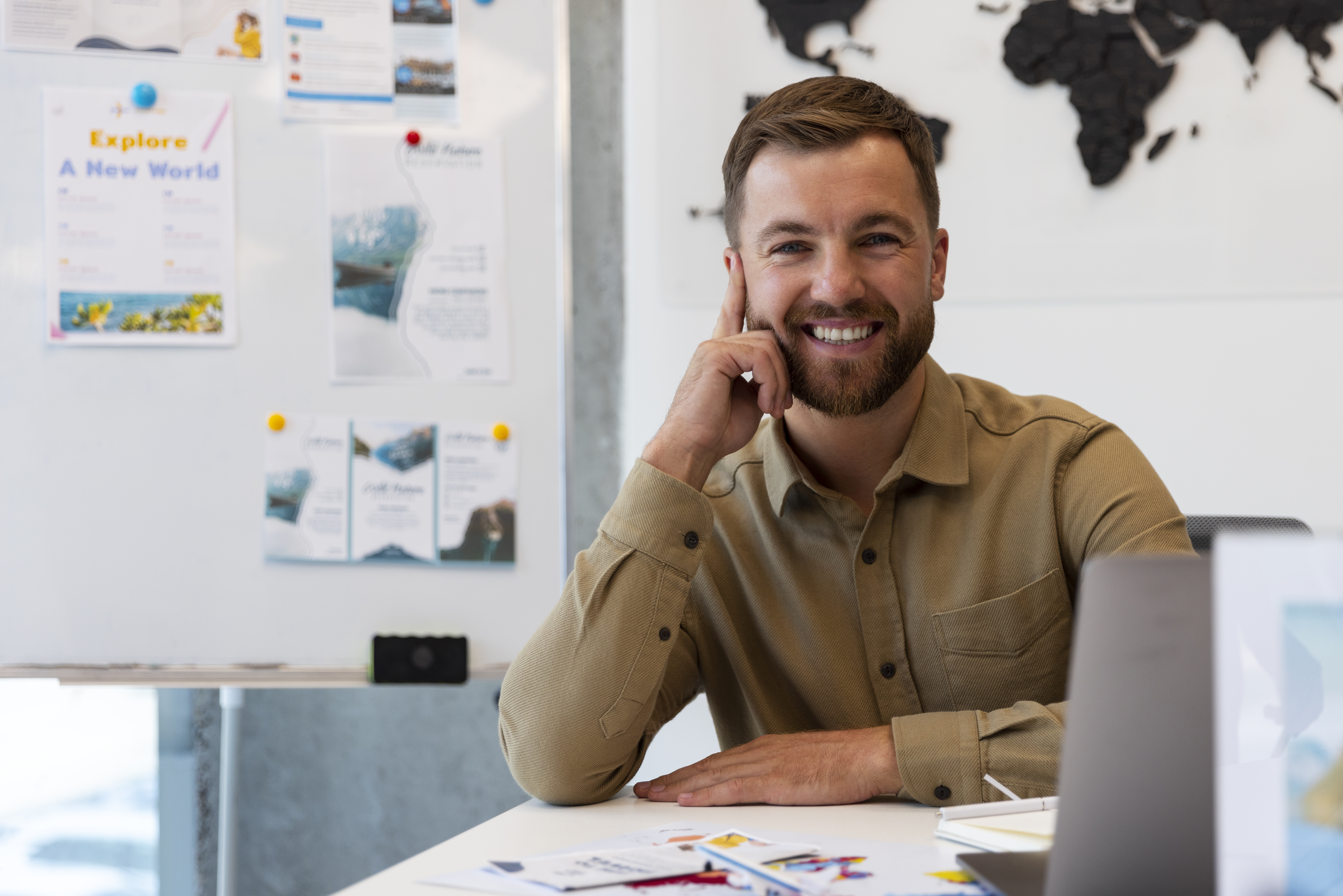 front-view-man-working-travel-agency